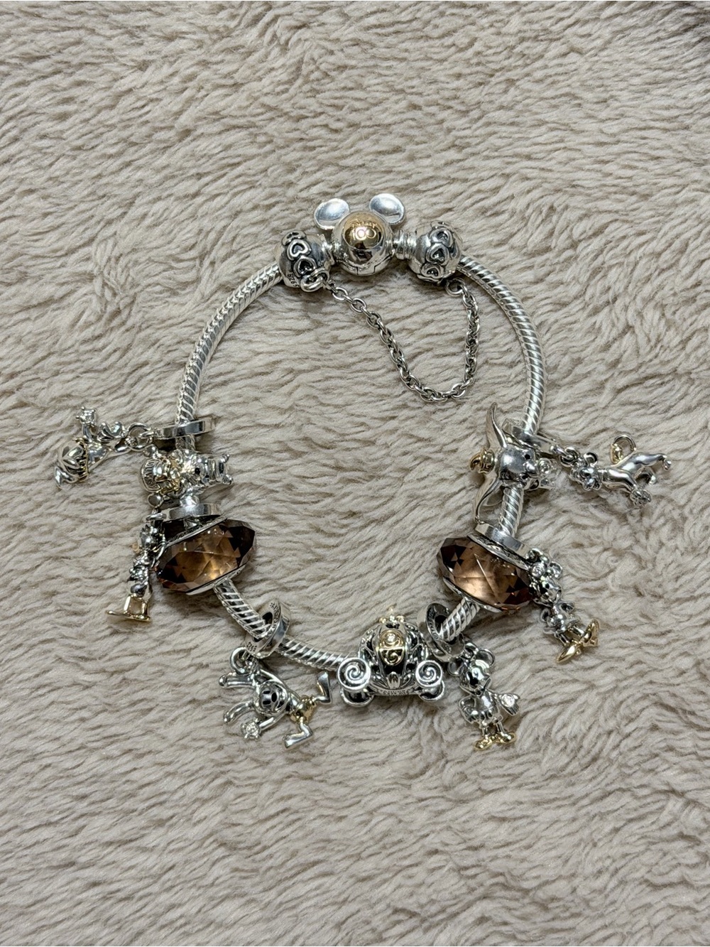 Pandora x Disney 100 Anniversary bracelet with charms.